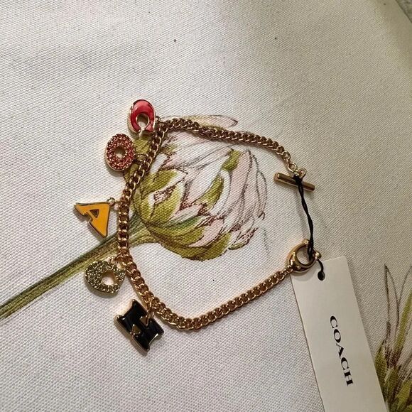 NWT COACH PavĂ© CrystalâEnamel Logo Charm Signature Letters Bracelet Gold #TSBR - Picture 7 of 8